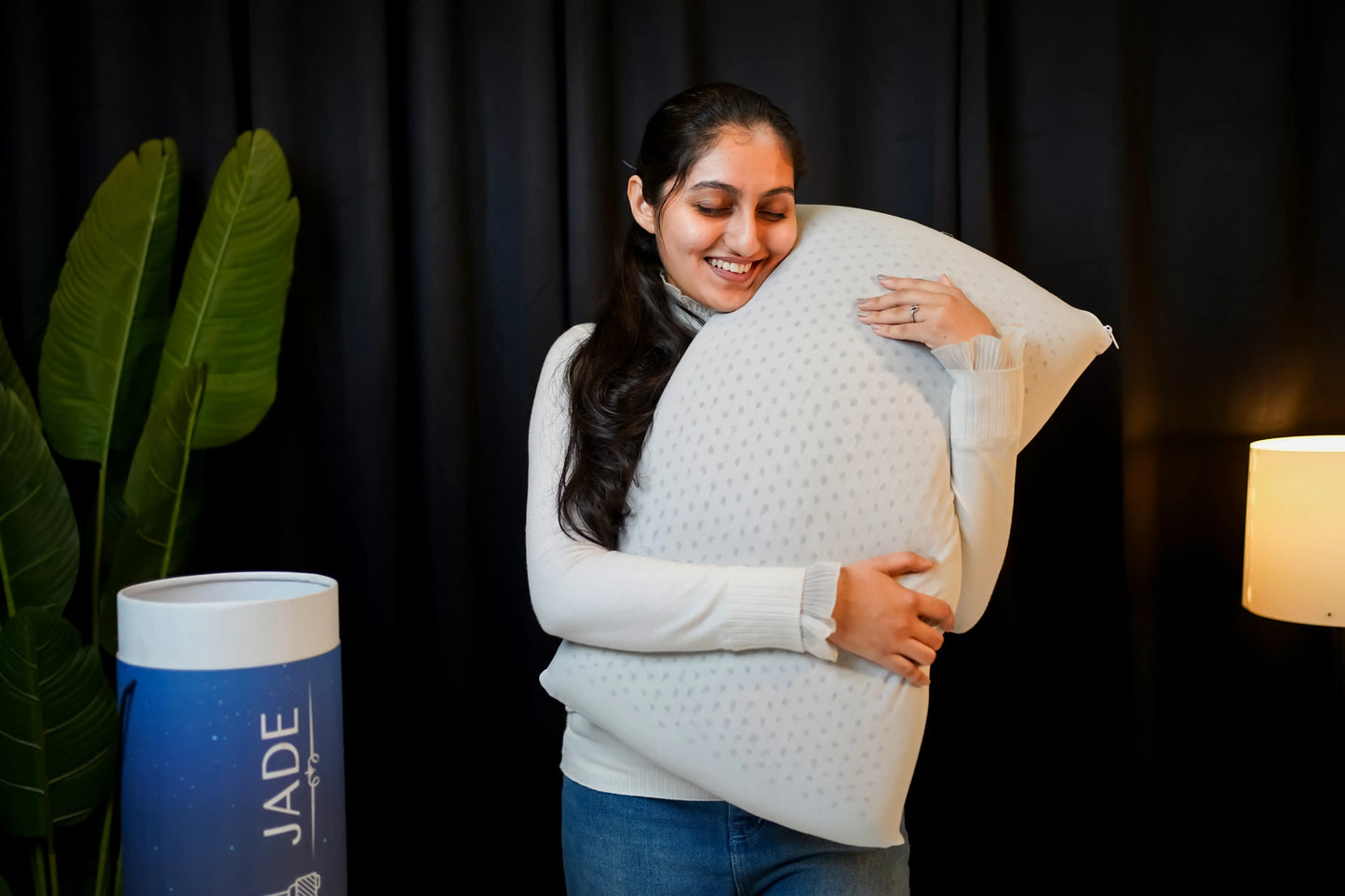 Woman holding a Jade latex pillow