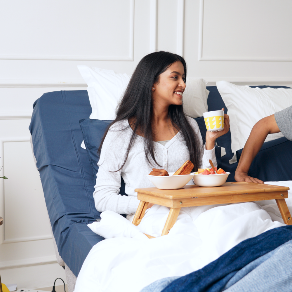 Woman having breakfast in bed